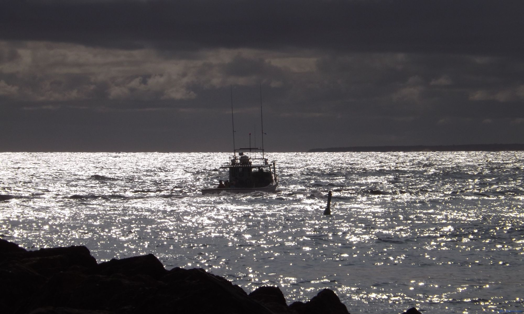 Fishing boat heading out from North Rustico harbour